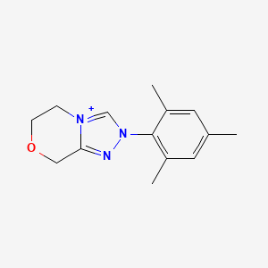 molecular formula C14H18N3O+ B12518341 2-Mesityl-6,8-dihydro-5H-[1,2,4]triazolo[3,4-c][1,4]oxazin-2-ium 
