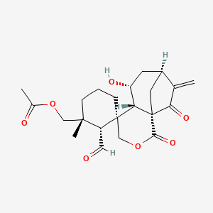 molecular formula C22H28O7 B1252295 [(1S,1'R,2'R,5R,6S,7R,9S)-2'-Formyl-7-hydroxy-1'-methyl-10-methylidene-2,11-dioxospiro[3-oxatricyclo[7.2.1.01,6]dodecane-5,3'-cyclohexane]-1'-yl]methyl acetate CAS No. 79859-42-0