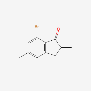 molecular formula C11H11BrO B12534593 7-Bromo-2,5-dimethyl-2,3-dihydro-1H-inden-1-one CAS No. 805244-84-2
