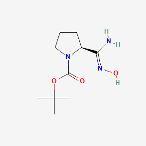 molecular formula C10H19N3O3 B12534692 tert-butyl (2S)-2-(N'-hydroxycarbamimidoyl)pyrrolidine-1-carboxylate 