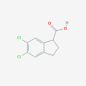 B125573 5,6-dichloro-2,3-dihydro-1H-indene-1-carboxylic acid CAS No. 157904-53-5
