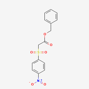 molecular formula C15H13NO6S B12559969 Acetic acid, [(4-nitrophenyl)sulfonyl]-, phenylmethyl ester CAS No. 151194-84-2