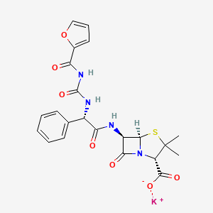 molecular formula C22H21KN4O7S B1260599 potassium;(2S,5R,6R)-6-[[(2S)-2-(furan-2-carbonylcarbamoylamino)-2-phenylacetyl]amino]-3,3-dimethyl-7-oxo-4-thia-1-azabicyclo[3.2.0]heptane-2-carboxylate 