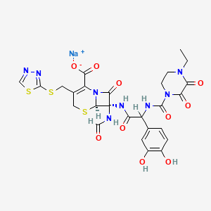molecular formula C26H25N8NaO10S3 B1260784 sodium;(6R,7S)-7-[[2-(3,4-dihydroxyphenyl)-2-[(4-ethyl-2,3-dioxopiperazine-1-carbonyl)amino]acetyl]amino]-7-formamido-8-oxo-3-(1,3,4-thiadiazol-2-ylsulfanylmethyl)-5-thia-1-azabicyclo[4.2.0]oct-2-ene-2-carboxylate CAS No. 133161-99-6