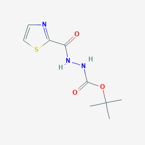 molecular formula C9H13N3O3S B12630244 tert-butyl N-(1,3-thiazole-2-carbonylamino)carbamate 