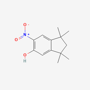 molecular formula C13H17NO3 B12654236 1,1,3,3-Tetramethyl-6-nitroindan-5-ol CAS No. 73183-80-9