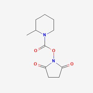 molecular formula C11H16N2O4 B12654974 (2,5-Dioxopyrrolidin-1-yl) 2-methylpiperidine-1-carboxylate 
