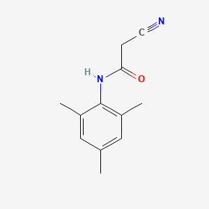 molecular formula C12H14N2O B1267255 2-cyano-N-mesitylacetamide CAS No. 24578-56-1