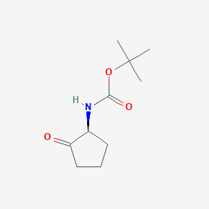 molecular formula C10H17NO3 B126742 tert-Butyl N-[(1S)-2-oxocyclopentyl]carbamate CAS No. 145106-46-3