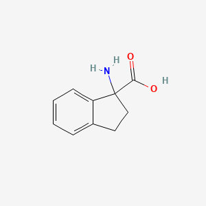 B1267537 1-Amino-2,3-dihydro-1h-indene-1-carboxylic acid CAS No. 3927-71-7