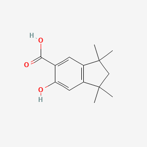 molecular formula C14H18O3 B12678378 2,3-Dihydro-6-hydroxy-1,1,3,3-tetramethyl-1H-indene-5-carboxylic acid CAS No. 74475-27-7