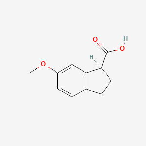6-Methoxy-2,3-dihydro-1H-indene-1-carboxylic acid