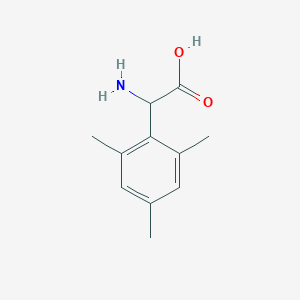 B1274429 Amino(mesityl)acetic acid CAS No. 500695-54-5