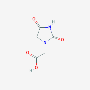 molecular formula C5H6N2O4 B1274635 (2,4-Dioxoimidazolidin-1-yl)acetic acid CAS No. 94738-31-5
