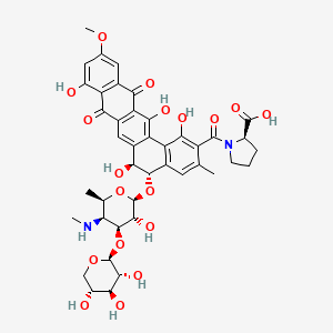 molecular formula C42H46N2O18 B12768524 D-Proline, 1-((5-((4,6-dideoxy-4-(methylamino)-3-O-beta-D-xylopyranosyl-beta-D-galactopyranosyl)oxy)-5,6,8,13-tetrahydro-1,6,9,14-tetrahydroxy-11-methoxy-3-methyl-8,13-dioxobenzo(a)naphthacen-2-yl)carbonyl)-, (5S-trans)- CAS No. 148677-05-8