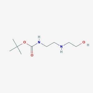 molecular formula C9H20N2O3 B1278379 tert-Butyl (2-((2-hydroxyethyl)amino)ethyl)carbamate CAS No. 208577-84-8