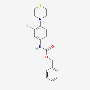 molecular formula C18H19FN2O2S B1278574 benzyl N-[3-fluoro-4-(thiomorpholin-4-yl)phenyl]carbamate CAS No. 168828-71-5