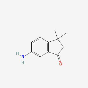 molecular formula C11H13NO B1281387 6-Amino-3,3-dimethylindan-1-one 