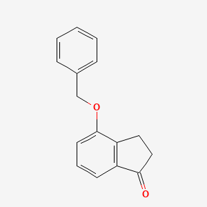 molecular formula C16H14O2 B1282477 4-(benzyloxy)-2,3-dihydro-1H-inden-1-one CAS No. 86045-82-1