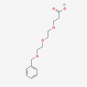 B1282989 3-(2-(2-(Benzyloxy)ethoxy)ethoxy)propanoic acid CAS No. 127457-63-0