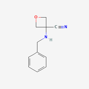 molecular formula C11H12N2O B1283558 3-(Benzylamino)oxetane-3-carbonitrile CAS No. 138650-20-1