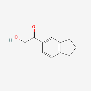 molecular formula C11H12O2 B12847574 1-(2,3-dihydro-1H-inden-5-yl)-2-hydroxyethanone 