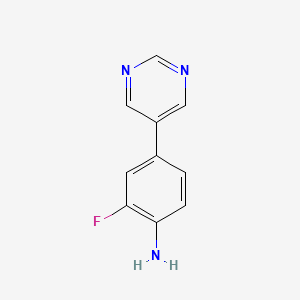 molecular formula C10H8FN3 B12848426 2-Fluoro-4-(5-pyrimidinyl)aniline 