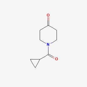 molecular formula C9H13NO2 B1285367 1-(Cyclopropylcarbonyl)piperidin-4-one CAS No. 63463-43-4