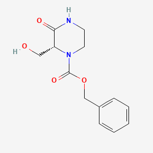 molecular formula C13H16N2O4 B12853929 (R)-Benzyl 2-(hydroxymethyl)-3-oxopiperazine-1-carboxylate 