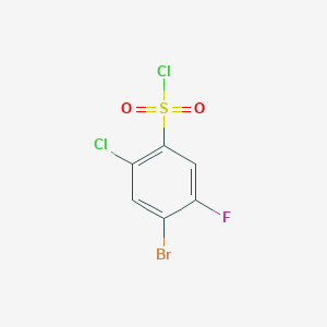 molecular formula C6H2BrCl2FO2S B12857778 4-Bromo-2-chloro-5-fluorobenzenesulfonyl chloride 
