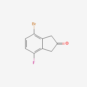 molecular formula C9H6BrFO B12864444 4-Bromo-7-fluoroindan-2-one 