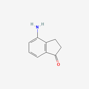 molecular formula C9H9NO B1289165 4-AMINO-1-INDANONE CAS No. 51135-91-2