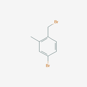 B1291462 4-Bromo-1-(bromomethyl)-2-methylbenzene CAS No. 156001-49-9