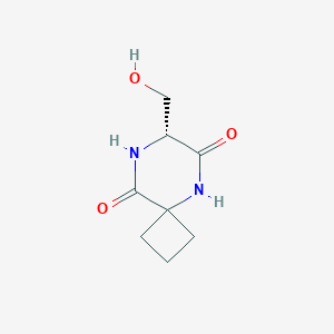 (7R)-7-(hydroxymethyl)-5,8-diazaspiro[3.5]nonane-6,9-dione