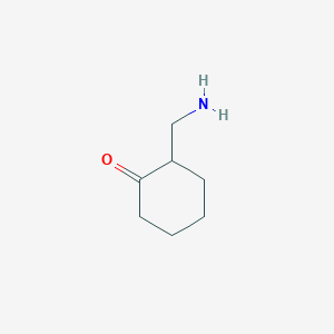 molecular formula C7H13NO B12972006 2-(Aminomethyl)cyclohexanone 