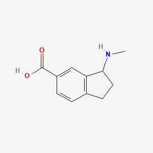 molecular formula C11H13NO2 B12982584 3-(Methylamino)indane-5-carboxylic acid 