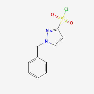 molecular formula C10H9ClN2O2S B12988461 1-Benzyl-1H-pyrazole-3-sulfonyl chloride 