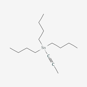 molecular formula C15H30Sn B1302387 Tributyl(1-propynyl)tin CAS No. 64099-82-7