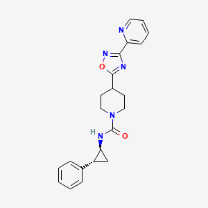molecular formula C22H23N5O2 B13028428 N-((1S,2R)-2-Phenylcyclopropyl)-4-(3-(pyridin-2-yl)-1,2,4-oxadiazol-5-yl)piperidine-1-carboxamide 