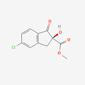 molecular formula C11H9ClO4 B13063676 methyl (2S)-6-chloro-2-hydroxy-3-oxo-1H-indene-2-carboxylate 