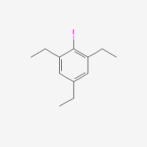 molecular formula C12H17I B13064174 1,3,5-Triethyl-2-iodobenzene 