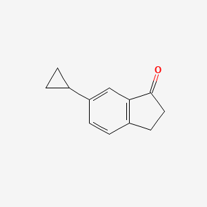 molecular formula C12H12O B13064612 6-cyclopropyl-2,3-dihydro-1H-inden-1-one 
