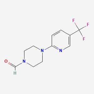 molecular formula C11H12F3N3O B1307640 4-[5-(Trifluoromethyl)pyridin-2-yl]piperazine-1-carbaldehyde CAS No. 792940-10-4
