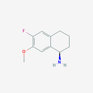 molecular formula C11H14FNO B13091892 (R)-6-Fluoro-7-methoxy-1,2,3,4-tetrahydronaphthalen-1-amine 
