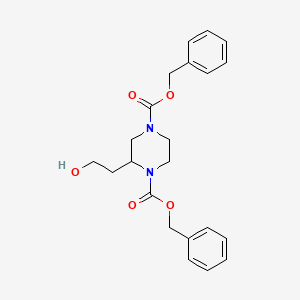 molecular formula C22H26N2O5 B13093772 Dibenzyl 2-(2-hydroxyethyl)piperazine-1,4-dicarboxylate CAS No. 1698026-83-3