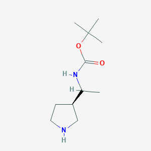 molecular formula C11H22N2O2 B13097094 (3R)-3-(1-(Boc-amino)ethyl)-pyrrolidine 