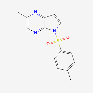 molecular formula C14H13N3O2S B13101844 2-Methyl-5-tosyl-5H-pyrrolo[2,3-b]pyrazine 