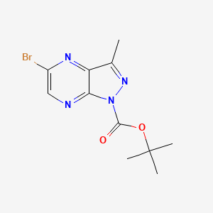 molecular formula C11H13BrN4O2 B13102590 tert-butyl 5-bromo-3-methyl-1H-pyrazolo[3,4-b]pyrazine-1-carboxylate CAS No. 1131041-61-6
