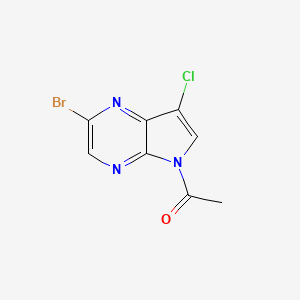 molecular formula C8H5BrClN3O B13105431 1-(2-Bromo-7-chloro-5H-pyrrolo[2,3-b]pyrazin-5-yl)ethanone 