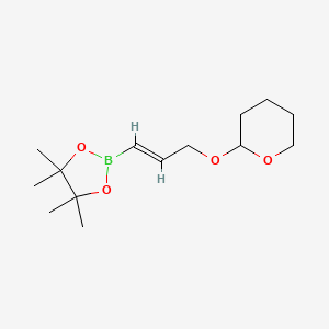 B1310679 2-[3-(4,4,5,5-Tetramethyl-[1,3,2]dioxaborolan-2-YL)-allyloxy]-tetrahydro-pyran CAS No. 642066-70-4